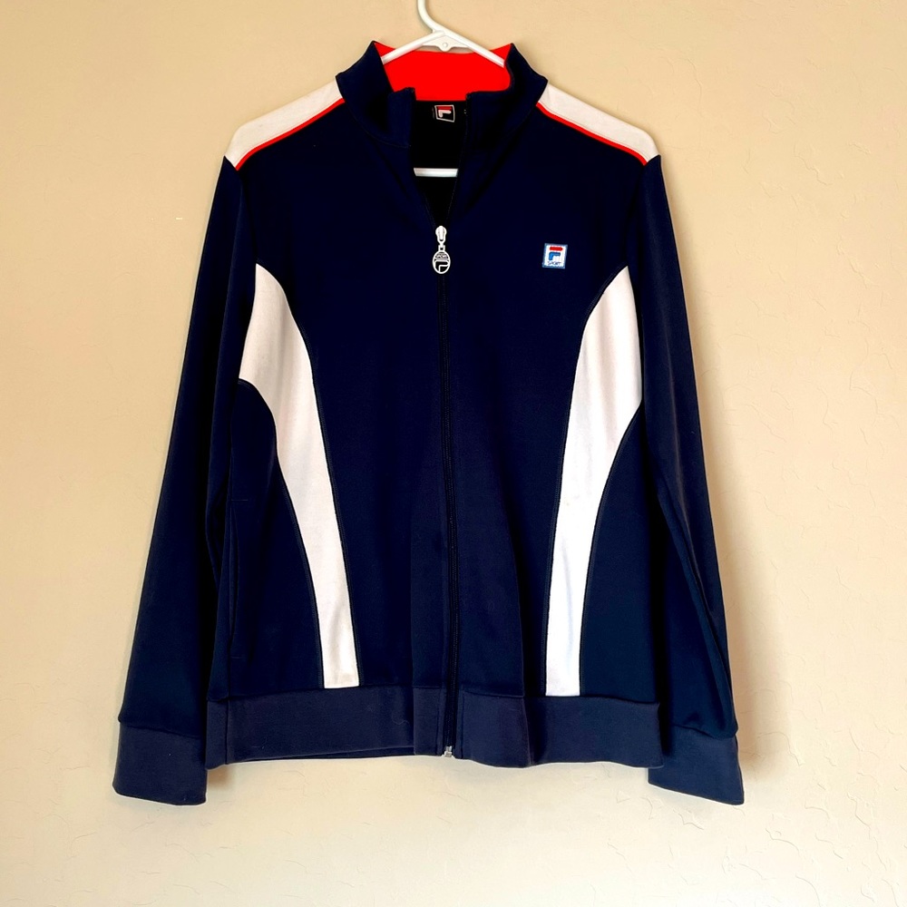 Fila zip-up athletic jacket. Navy blue with white and orange trim.
